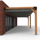 Overkapping pergola tegen gevel twee schaduwdoek - Rijpex